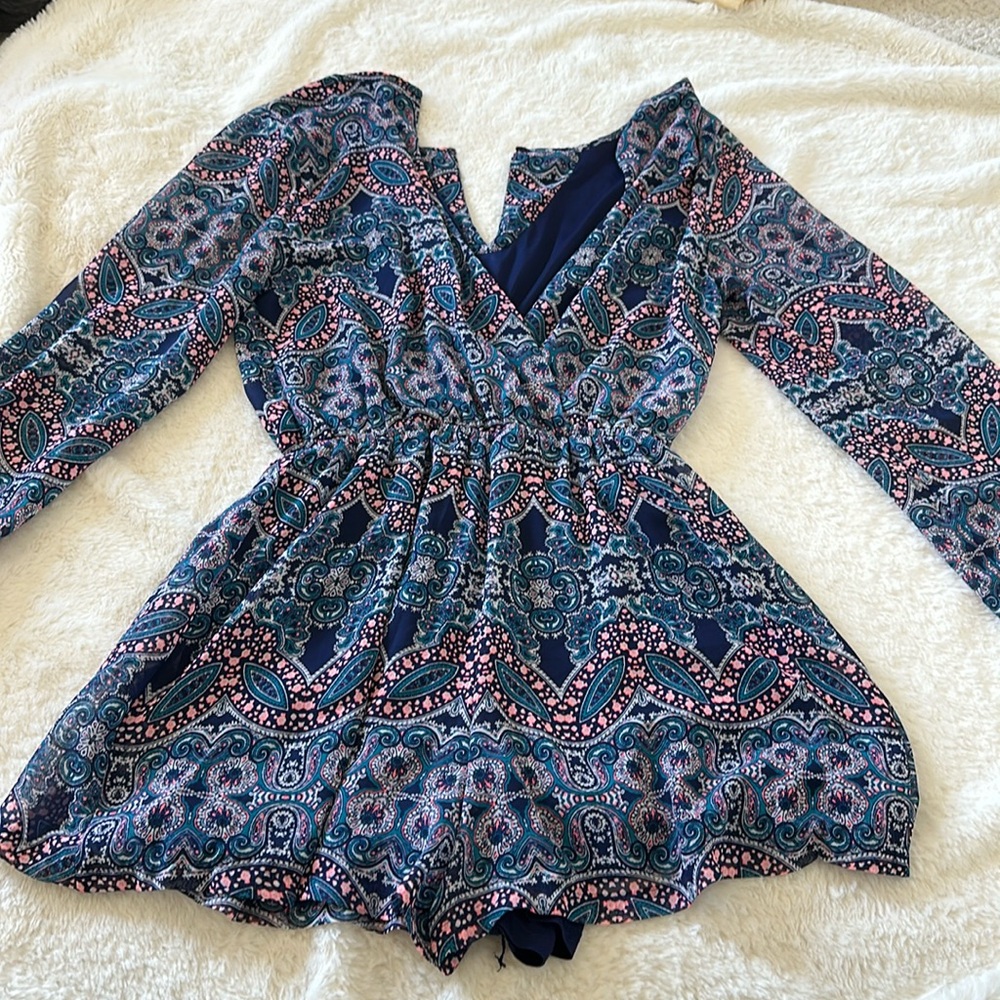 Like new condition, blue and pink, long sleeve romper